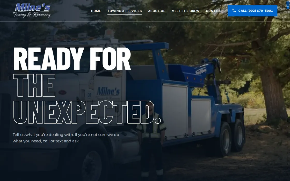 Screenshot of the Milne’s Towing & Services page: the blue heavy wrecker parked under trees, behind the headline Ready for the unexpected.